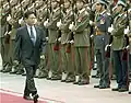 General Khin Nyunt inspecting a Vietnamese honor guard at the Presidential Palace in Hanoi, Vietnam, on 9 August 2004.