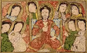 Kitâb al-Diryâq, 1198-1199, folio 24. Royal court detail, ruler in Turkic dress, wearing the sharbush hat.