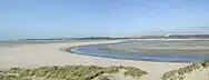A river estuary with several shoals exposed