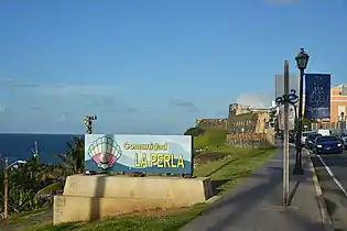 Comunidad La Perla sign