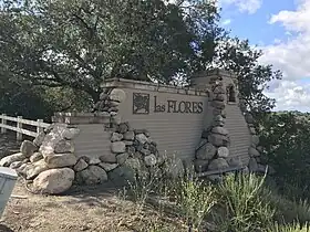 Entrance sign for Las Flores along Oso Parkway