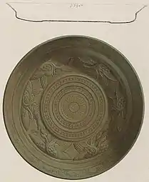 The first publication of a Phoenician metal bowl, one of 16 metal bowls from Nimrud with a Phoenician inscription (see letters on top sketch of the side profile)