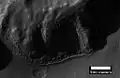 Layers in mantle deposit, as seen by HiRISE, under the HiWish program. Mantle was probably formed from snow and dust falling during a different climate. Location is Thaumasia quadrangle.