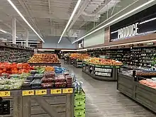 A picture of the newest Safeway store themes, dubbed "Lifestyle 2.0" internally..mw-parser-output cite.citation{font-style:inherit;word-wrap:break-word}.mw-parser-output .citation q{quotes:"\"""\"""'""'"}.mw-parser-output .citation:target{background-color:rgba(0,127,255,0.133)}.mw-parser-output .id-lock-free.id-lock-free a{background:url("//upload.wikimedia.org/wikipedia/commons/6/65/Lock-green.svg")right 0.1em center/9px no-repeat}body:not(.skin-timeless):not(.skin-minerva) .mw-parser-output .id-lock-free a{background-size:contain}.mw-parser-output .id-lock-limited.id-lock-limited a,.mw-parser-output .id-lock-registration.id-lock-registration a{background:url("//upload.wikimedia.org/wikipedia/commons/d/d6/Lock-gray-alt-2.svg")right 0.1em center/9px no-repeat}body:not(.skin-timeless):not(.skin-minerva) .mw-parser-output .id-lock-limited a,body:not(.skin-timeless):not(.skin-minerva) .mw-parser-output .id-lock-registration a{background-size:contain}.mw-parser-output .id-lock-subscription.id-lock-subscription a{background:url("//upload.wikimedia.org/wikipedia/commons/a/aa/Lock-red-alt-2.svg")right 0.1em center/9px no-repeat}body:not(.skin-timeless):not(.skin-minerva) .mw-parser-output .id-lock-subscription a{background-size:contain}.mw-parser-output .cs1-ws-icon a{background:url("//upload.wikimedia.org/wikipedia/commons/4/4c/Wikisource-logo.svg")right 0.1em center/12px no-repeat}body:not(.skin-timeless):not(.skin-minerva) .mw-parser-output .cs1-ws-icon a{background-size:contain}.mw-parser-output .cs1-code{color:inherit;background:inherit;border:none;padding:inherit}.mw-parser-output .cs1-hidden-error{display:none;color:#d33}.mw-parser-output .cs1-visible-error{color:#d33}.mw-parser-output .cs1-maint{display:none;color:#2C882D;margin-left:0.3em}.mw-parser-output .cs1-format{font-size:95%}.mw-parser-output .cs1-kern-left{padding-left:0.2em}.mw-parser-output .cs1-kern-right{padding-right:0.2em}.mw-parser-output .citation .mw-selflink{font-weight:inherit}html.skin-theme-clientpref-night .mw-parser-output .cs1-maint{color:#18911F}html.skin-theme-clientpref-night .mw-parser-output .cs1-visible-error,html.skin-theme-clientpref-night .mw-parser-output .cs1-hidden-error{color:#f8a397}@media(prefers-color-scheme:dark){html.skin-theme-clientpref-os .mw-parser-output .cs1-visible-error,html.skin-theme-clientpref-os .mw-parser-output .cs1-hidden-error{color:#f8a397}html.skin-theme-clientpref-os .mw-parser-output .cs1-maint{color:#18911F}}"Safeway lighting disaster comes to the northwest". RetailWatchers.com. August 20, 2017.