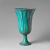 Ancient Egyptian lotiform cup; 1295-1185 BC; faience; height: 15&nbsp;cm, diameter: 9.1&nbsp;cm; Metropolitan Museum of Art