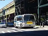 A Q60 bus outside the station