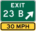 E5-1a and E13-1PExit number sign with speed advisory