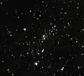 Magnifying the distant universe through MACS J0454.1-0300.