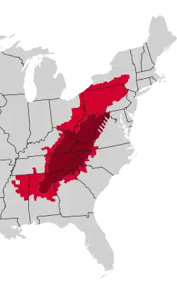 Red and dark red counties form the Appalachian Regional Commission; dark red and dark red striped counties form traditional Appalachia.