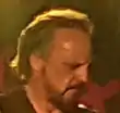 Mark Evans performing with Rose Tattoo in Birmingham, UK, 11 September 2018 (cropped).png