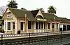 A pink railroad station building