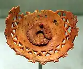 Pendant made from a spondylus shell,  Western Mexico shaft tomb tradition, 200 BC to 200 AD, now at the Art Institute of Chicago, United States.