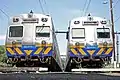 Two Hitachis in Metro Trains Melbourne livery, stabled near North Melbourne in December 2009