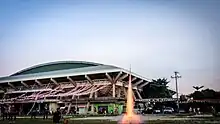 A model rocket being launched outdoors