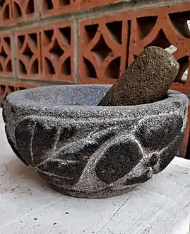 Molcáxitl with flower petal decoration, originating from San Salvador el Seco, Puebla, México