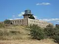 Watchtower over wineyards, known as the "Tour des Anglais" ("Tower of the Englishes"), current establishment of the Army