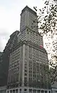 Montague–Court Building, a high-rise building clad in stone, viewed from street level