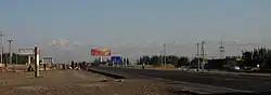 Outside of Aksu City with Tian Shan range in the background