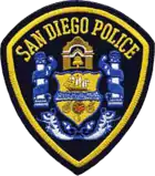 Patch of the SDPD. Introduced in 1988, these patches were originally brown to match the tan uniforms of the time, before being changed to blue in 1998.