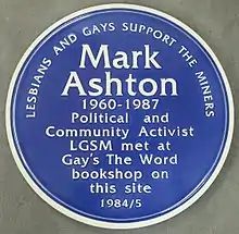 Blue plaque which reads 'Mark Ashton 1960-1987 Political and Community Activist LGSM met at Gay's The Word bookshop on this site 1984/5'