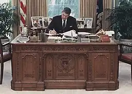 Ronald Reagan working at the Resolute desk in the Oval Office