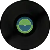 12-inch vinyl record disc with green-and-blue inner label