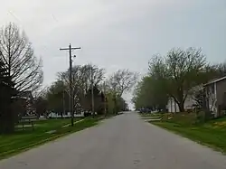 The village of Raritan along its main street, 400 N in April 2017