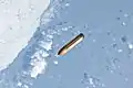 ET-138 floats away from the shuttle.