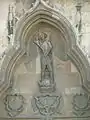 The three coats of arms of Sigismund I on west portal