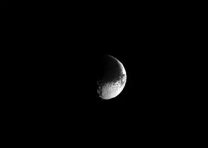 A much clearer image of Iapetus's Taijitu (Yin-Yang) appearance, taken by Cassini on August 30, 2013 from a distance of 2.5 million kilometers (1.5 million miles). The crater near the terminator at the lower center is  Ganelon.