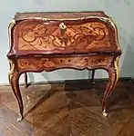 Rococo slant-top desk; c.1750; oak, kingwood marquetry, amaranth wood, satiné, gilt bronze; unknown dimensions; Musée des Arts Décoratifs (Paris)