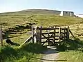 Footpath entry near Bungalow railway station typically used to climb Snaefell