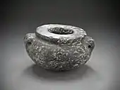 Squat vase with lug handles; 3050–2920&nbsp;BC; porphyry; 11 × 20&nbsp;cm; Los Angeles County Museum of Art (US)