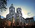 Saint Joseph's Church as seen with many parishioners attending a Good Friday procession (photo stretched)
