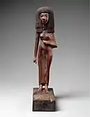 Statuette of the lady Tiye; 1390-1349 BC; wood, carnelian, gold, glass, Egyptian blue and paint; height: 24&nbsp;cm; Metropolitan Museum of Art