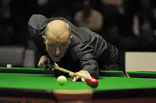 Steve Davis playing a trick shot exhibition during the break of the final