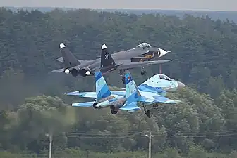 Su-47 next to a Sukhoi Su-35UB at the MAKS-2003 air show.