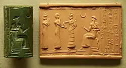 Sumerian cylinder seal and impression, dated c. 2100 BC, of Ḫašḫamer, ensi (governor) of Iškun-Sin c. 2100 BC. The seated figure is probably king Ur-Nammu, bestowing the governorship on Ḫašḫamer, who is led before him by Lamma (protective goddess)..mw-parser-output cite.citation{font-style:inherit;word-wrap:break-word}.mw-parser-output .citation q{quotes:"\"""\"""'""'"}.mw-parser-output .citation:target{background-color:rgba(0,127,255,0.133)}.mw-parser-output .id-lock-free.id-lock-free a{background:url("//upload.wikimedia.org/wikipedia/commons/6/65/Lock-green.svg")right 0.1em center/9px no-repeat}body:not(.skin-timeless):not(.skin-minerva) .mw-parser-output .id-lock-free a{background-size:contain}.mw-parser-output .id-lock-limited.id-lock-limited a,.mw-parser-output .id-lock-registration.id-lock-registration a{background:url("//upload.wikimedia.org/wikipedia/commons/d/d6/Lock-gray-alt-2.svg")right 0.1em center/9px no-repeat}body:not(.skin-timeless):not(.skin-minerva) .mw-parser-output .id-lock-limited a,body:not(.skin-timeless):not(.skin-minerva) .mw-parser-output .id-lock-registration a{background-size:contain}.mw-parser-output .id-lock-subscription.id-lock-subscription a{background:url("//upload.wikimedia.org/wikipedia/commons/a/aa/Lock-red-alt-2.svg")right 0.1em center/9px no-repeat}body:not(.skin-timeless):not(.skin-minerva) .mw-parser-output .id-lock-subscription a{background-size:contain}.mw-parser-output .cs1-ws-icon a{background:url("//upload.wikimedia.org/wikipedia/commons/4/4c/Wikisource-logo.svg")right 0.1em center/12px no-repeat}body:not(.skin-timeless):not(.skin-minerva) .mw-parser-output .cs1-ws-icon a{background-size:contain}.mw-parser-output .cs1-code{color:inherit;background:inherit;border:none;padding:inherit}.mw-parser-output .cs1-hidden-error{display:none;color:#d33}.mw-parser-output .cs1-visible-error{color:#d33}.mw-parser-output .cs1-maint{display:none;color:#2C882D;margin-left:0.3em}.mw-parser-output .cs1-format{font-size:95%}.mw-parser-output .cs1-kern-left{padding-left:0.2em}.mw-parser-output .cs1-kern-right{padding-right:0.2em}.mw-parser-output .citation .mw-selflink{font-weight:inherit}html.skin-theme-clientpref-night .mw-parser-output .cs1-maint{color:#18911F}html.skin-theme-clientpref-night .mw-parser-output .cs1-visible-error,html.skin-theme-clientpref-night .mw-parser-output .cs1-hidden-error{color:#f8a397}@media(prefers-color-scheme:dark){html.skin-theme-clientpref-os .mw-parser-output .cs1-visible-error,html.skin-theme-clientpref-os .mw-parser-output .cs1-hidden-error{color:#f8a397}html.skin-theme-clientpref-os .mw-parser-output .cs1-maint{color:#18911F}}"Cylinder vase". Collections Search – Museum of Fine Arts, Boston. May 20, 1987. Archived from the original on November 11, 2021. Retrieved November 11, 2021.