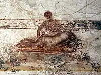 An erotic scene on a bed. Wall painting. Suburban baths, Pompeii.  62 to 79 CE