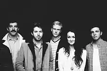 The Paper Kites in 2012. L–R: David Powys, Sam Bentley, Sam Rasmussen, Christina Lacy, Josh Bentley