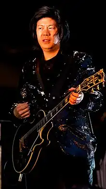 Iha with The Smashing Pumpkins in 2019.