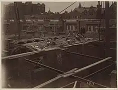 Steel I-beams framing the building provide structural support for Guastavino tile arches