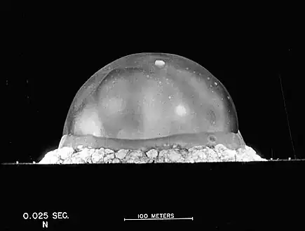 The Trinity explosion, 25 ms after detonation. The viewed fireball hemisphere's highest point in this image is about 200 metres (660&nbsp;ft) high.