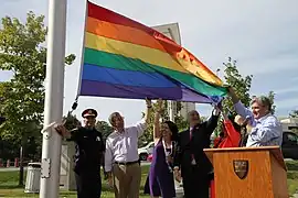 Chief Charles Bordeleau, Mayor Jim Watson, Pride chair Jodie McNamara, and US Ambassador Bruce Heyman| in 2014