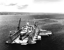 The ship on a floating dry dock for repairs