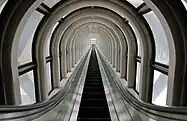 The escalator crossing the wide atrium-like space