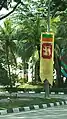 Hung vertically, along a street in Malaysia