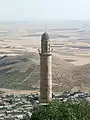 Minaret of the Grand Mosque of Mardin (12th century) and the view of the Mesopotamian plains.
