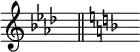 { \omit Score.TimeSignature { \key aes \major s8^"" \bar "||" \key f \major s8^""}}